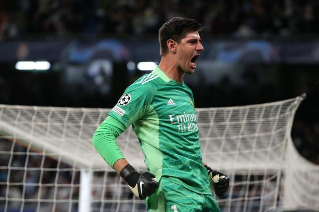 hth体育怎么进入官网-脚底蹭指尖托！库尔图瓦极限神扑成就皇马神奇逆转